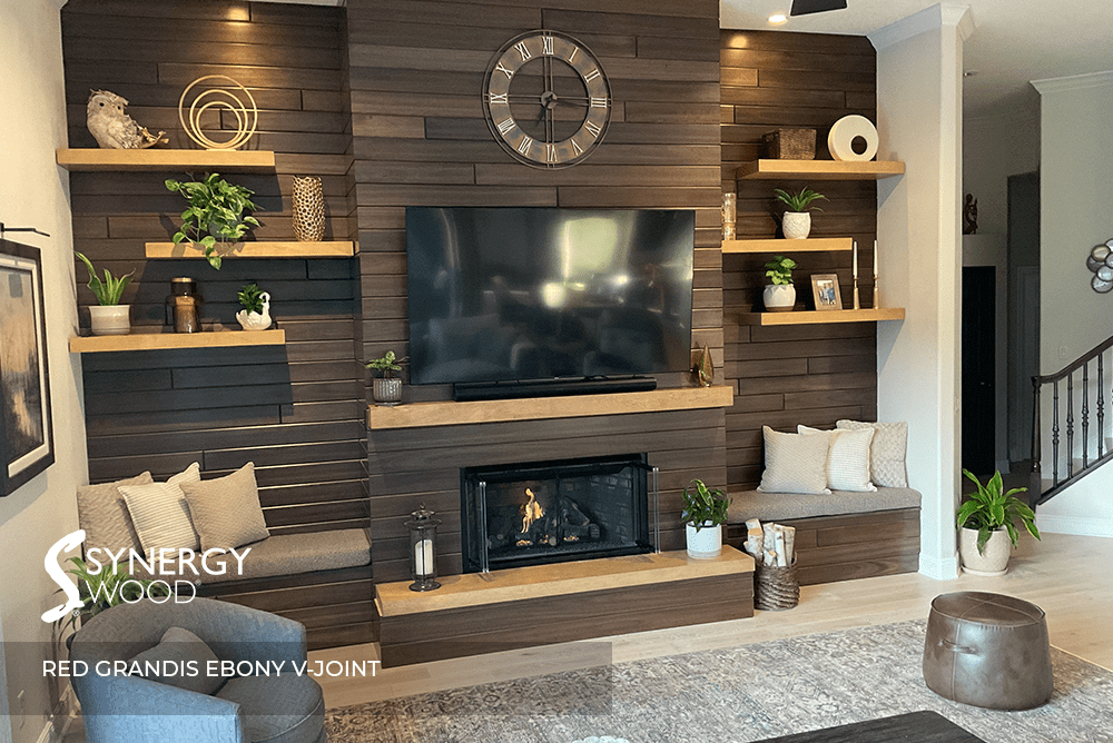 Synergy Wood Red Grandis Ebony V-Joint Accent wall around a fireplace.